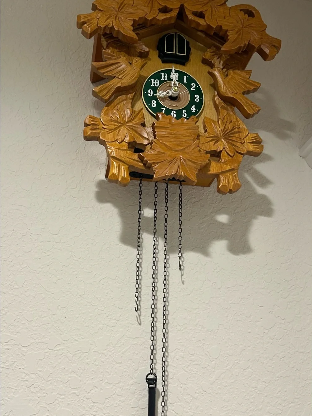 Carved Wooden Cuckoo Wall Clock with Green Dial